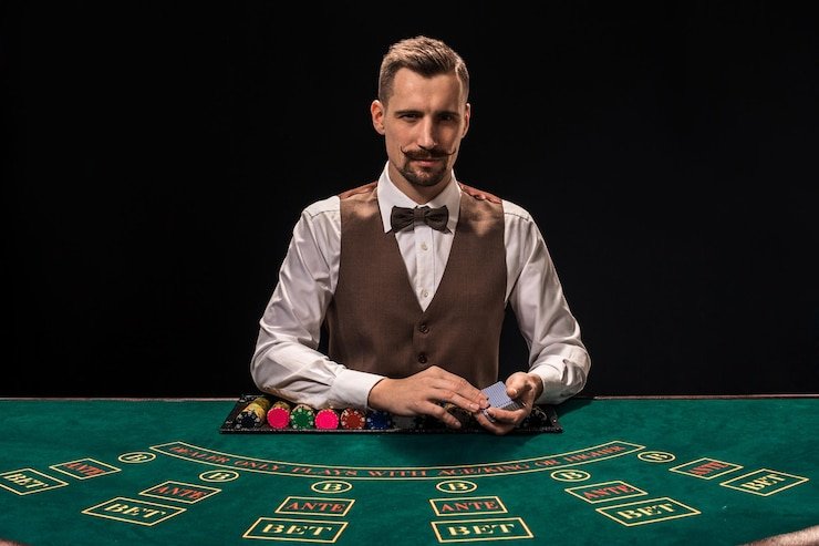 Casino Hold'em live table on huntertoto link showing dealer and community cards